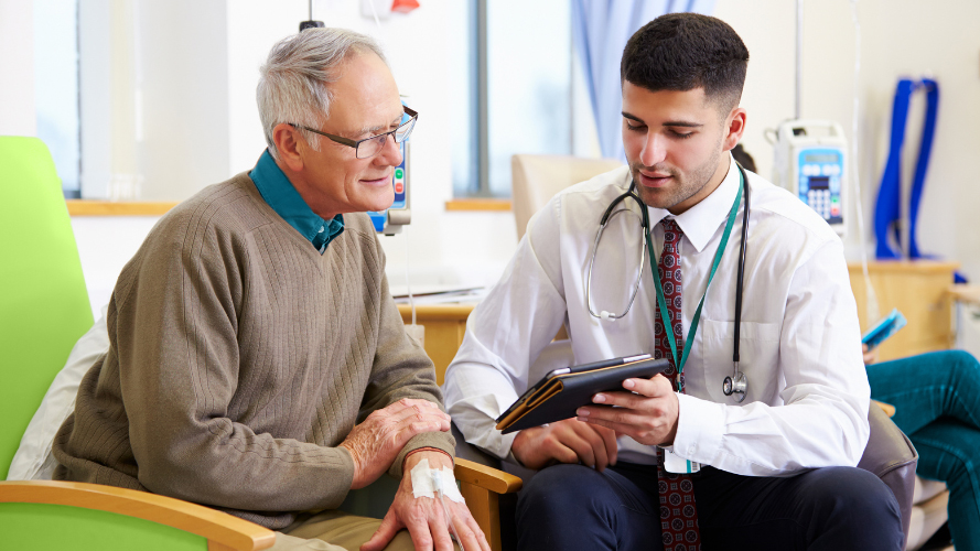Infusion Center- Male-Patient-Provider-Tablet